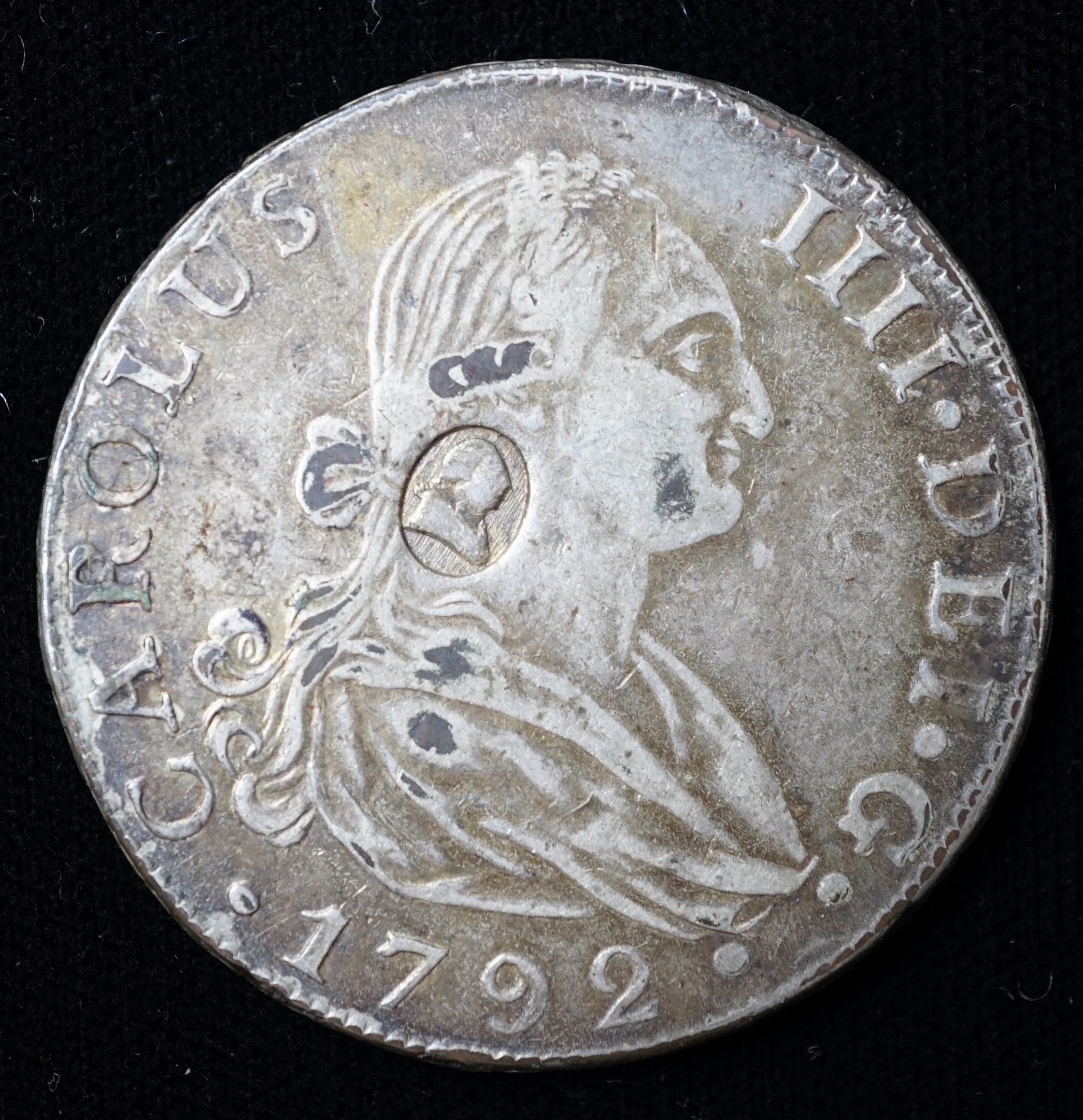 A contemporary copy? - a George III silver dollar, head of George III countermark on a replica of a 1772 Mexico mint 8 Reales, edge knocks otherwise VF